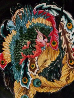 "La Fenice" di Hokusai - Piatto da 30 cm. di diametro  - particolare; Lavoro realizzato all'interno del laboratorio; Autrice: Deborah D'Alberto. Tecnica: Maiolica. 